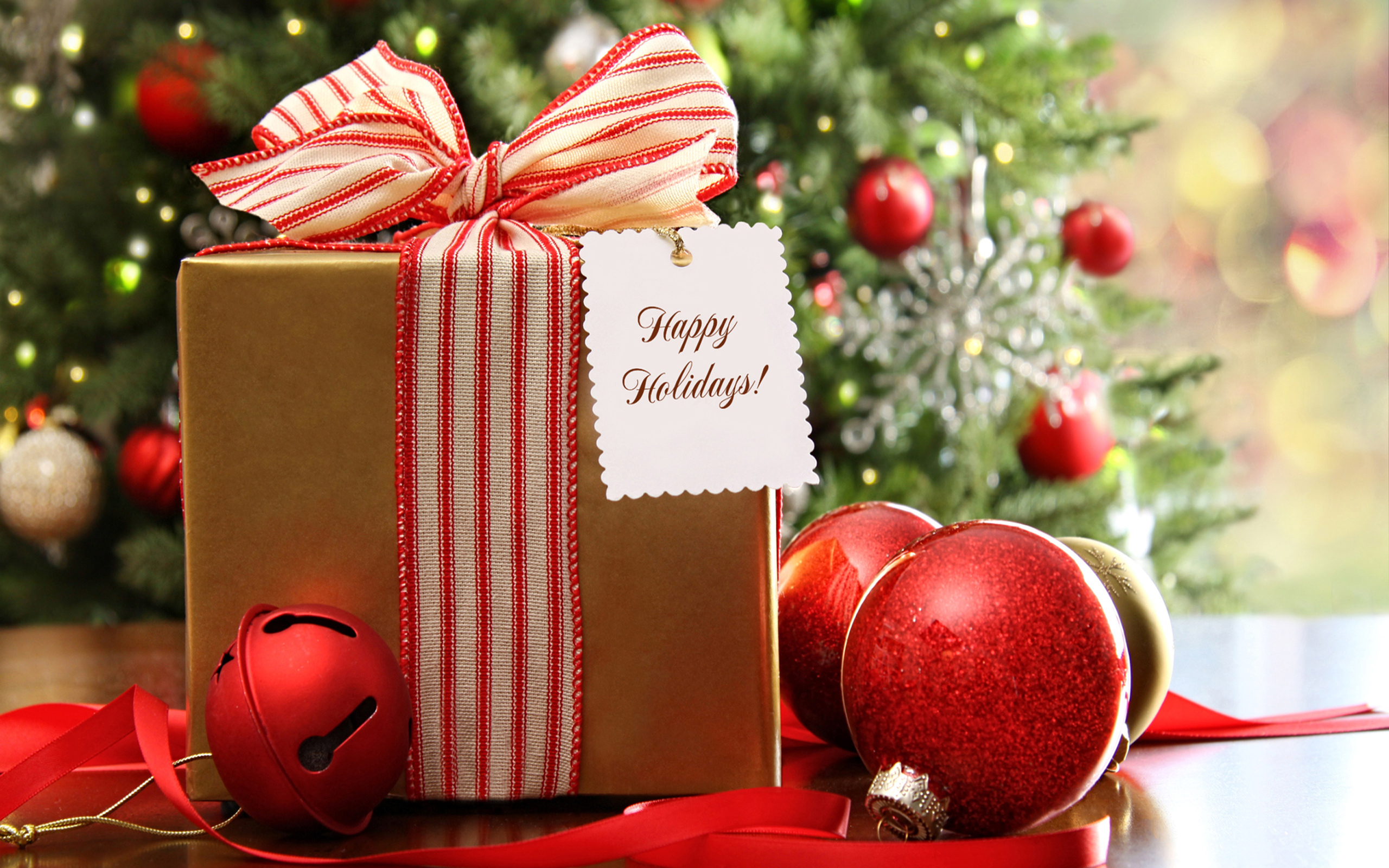 happy holidays gold present red bell bulb.jpg